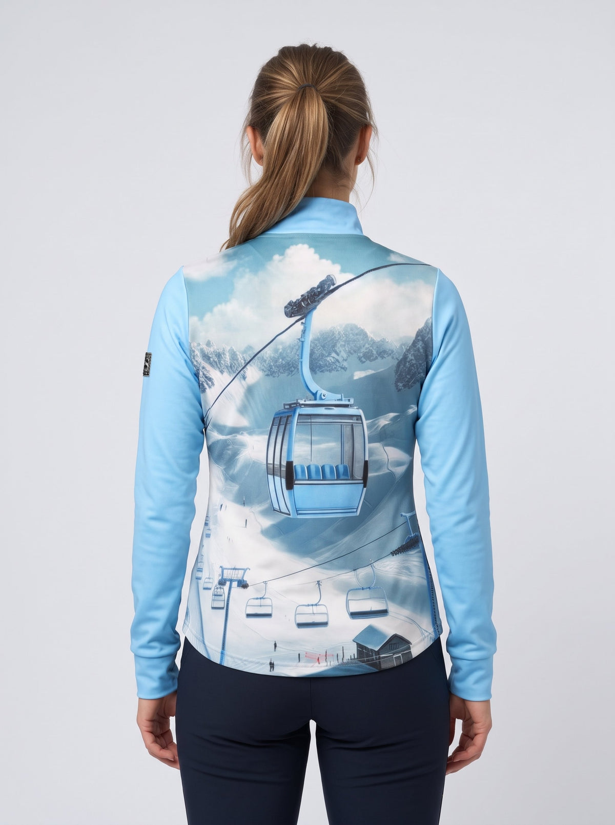 Gutski Champagnehirsch women's ski midlayer in light blue, back
