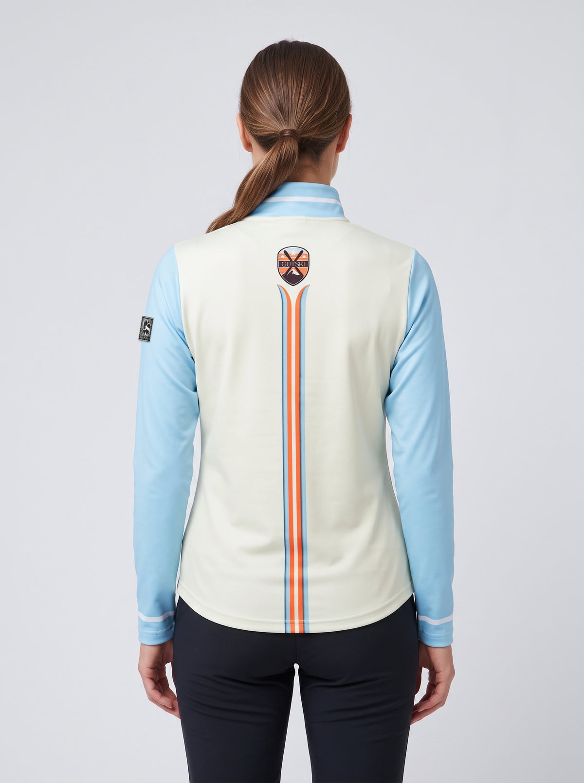 Gutski Miss Ski women's ski midlayer in blue, back