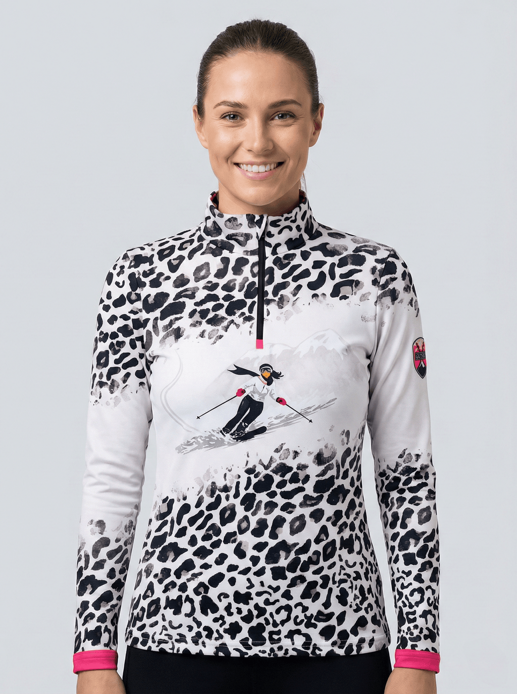 Gutski dames skipully wit met panterprint en skiër illustratie voorkant.