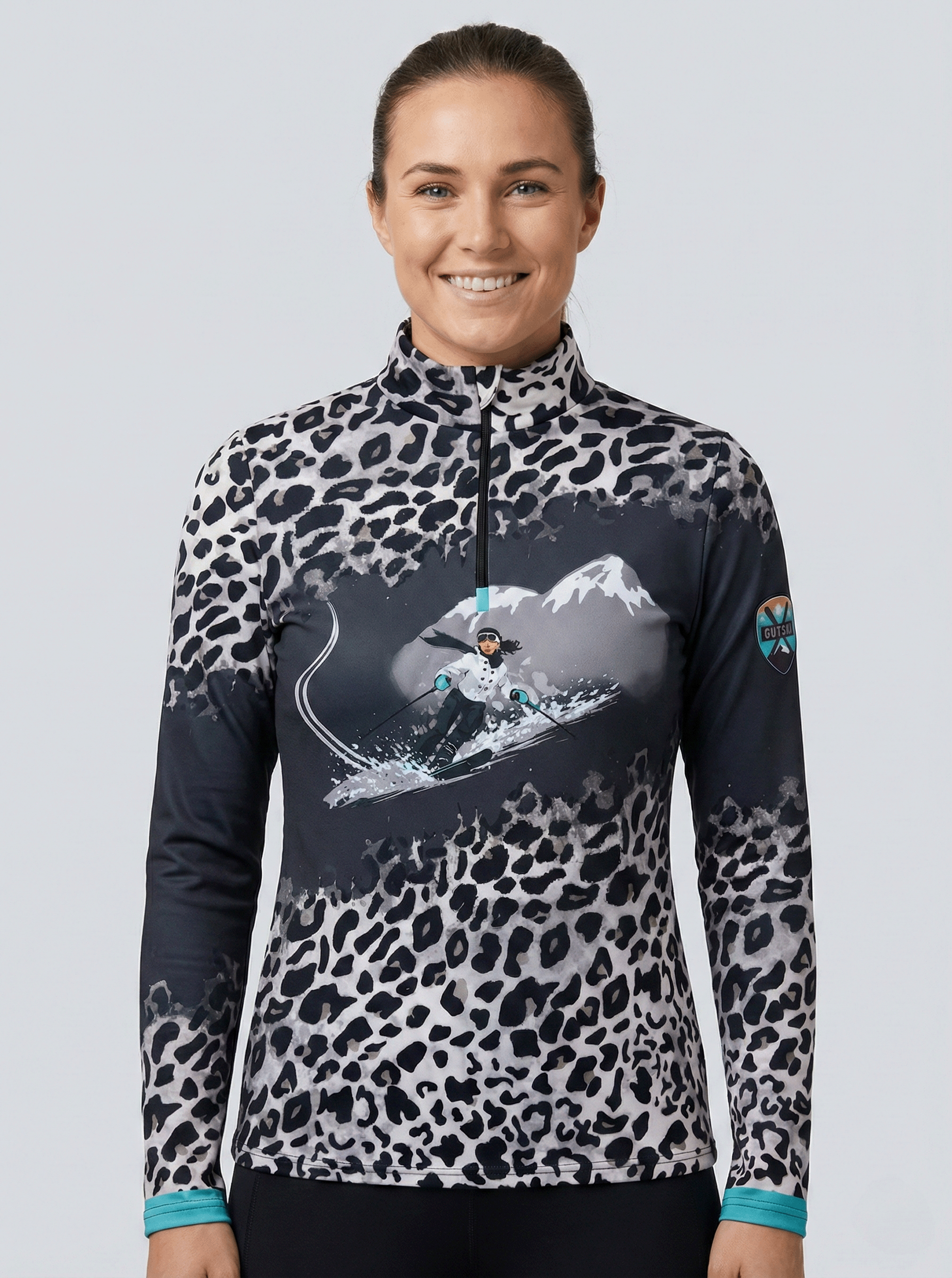 Gutski dames skipully donkergrijs antraciet met turquoise details.